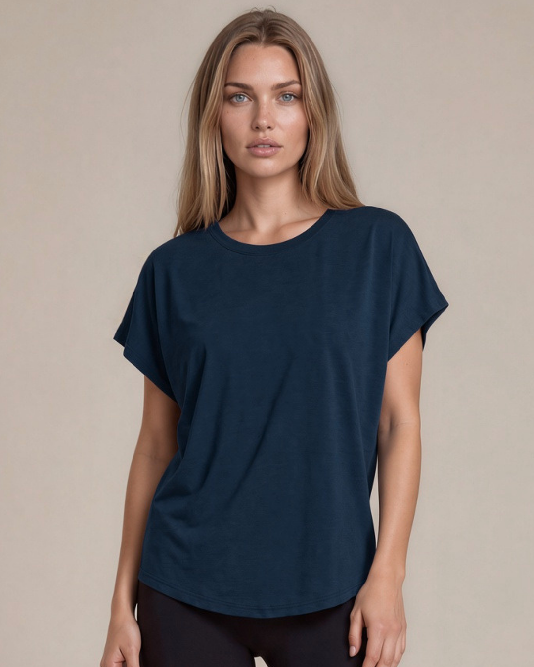 Women's viscose bamboo & organic cotton poncho tee in navy. Super soft, breathable, cooling, dolman fit. Sustainably made in USA. Sizes XS–XL.