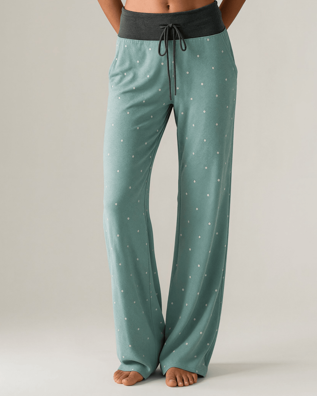 Made in USA. Women's super cute and cozy polka dot relaxed fit pajama pants in sage or navy with drawstring 78% Polyester, 18% Rayon, 4% Spandex. S-XL.