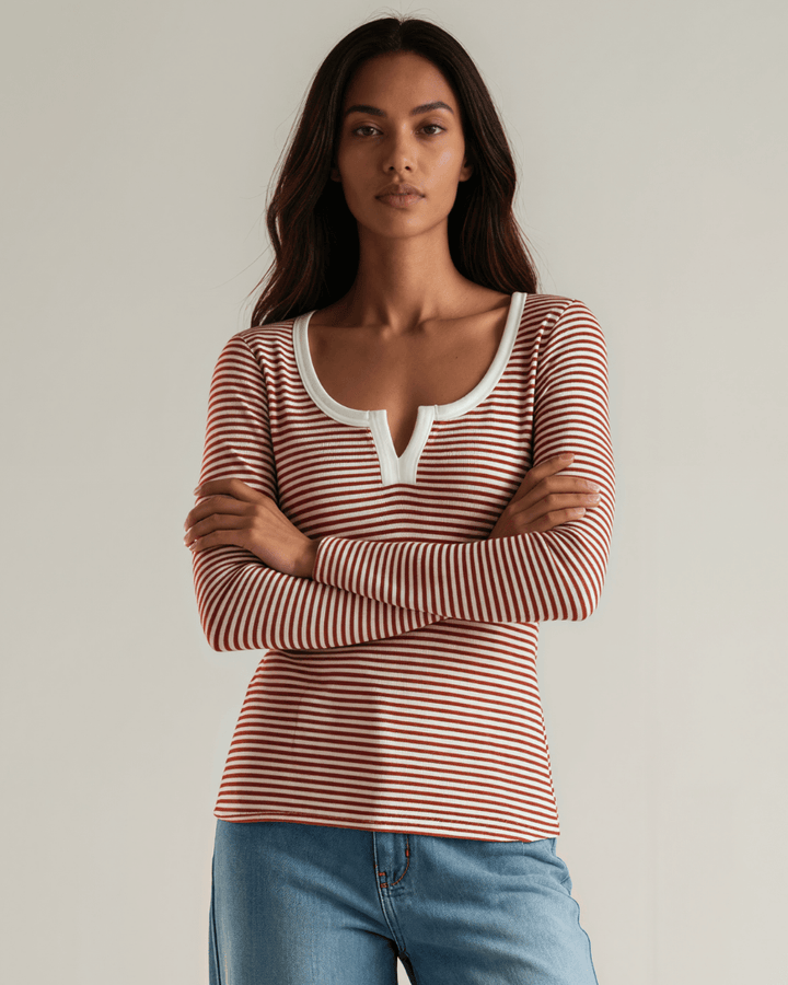 Made in USA. Burgundy &amp; Off White striped fitted rib knit top. Split V-neck with contrast trim, long sleeves. 97% rayon. Sizes S–XL.