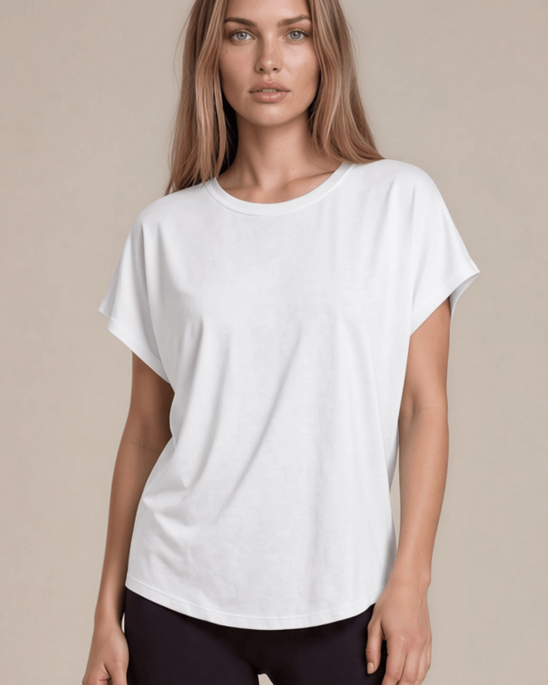 Women's viscose bamboo & organic cotton poncho tee in white. Super soft, breathable, cooling, dolman fit. Sustainably made in USA. Sizes XS–XL.