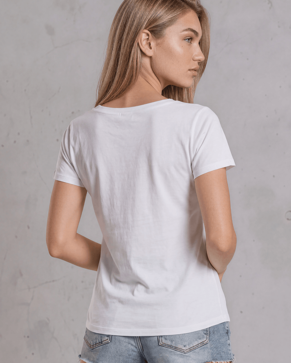 Made in USA, women's weekend boxy tee has a loose, flowy fit and wide neckline. Shop Black or White in sizes XS–2XL; 50% Lenzing Modal, 50% Polyester.