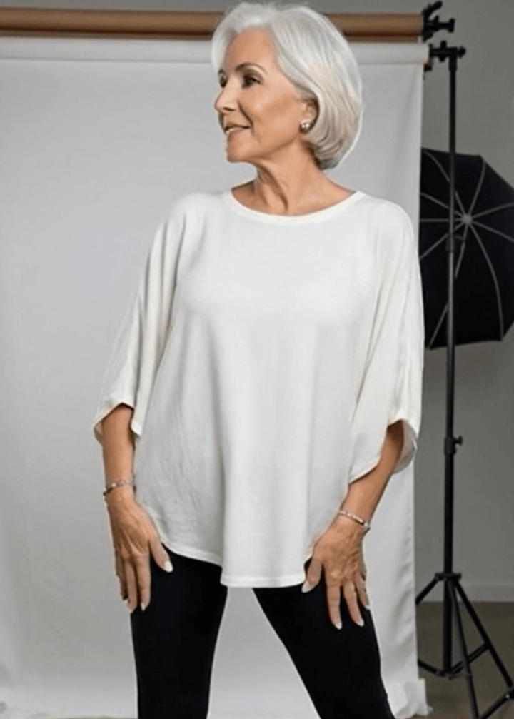 Slip into effortless style with this made in USA oversized dolman sleeve cotton top, designed for maximum comfort without compromise. The soft, lightweight 95% cotton blend with 5% spandex drapes beautifully while moving with you