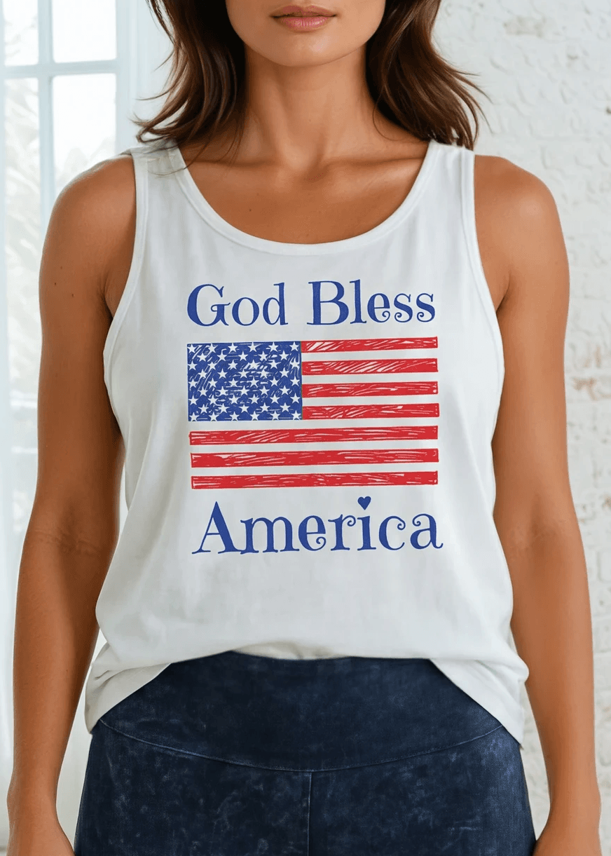 God Bless America Flag Graphic Tank Top | Made in USA Cotton, Say it in something made here! USA-made God Bless America flag graphic tank in white garment wash. Soft 95% cotton, relaxed fit, grown & sewn in America.