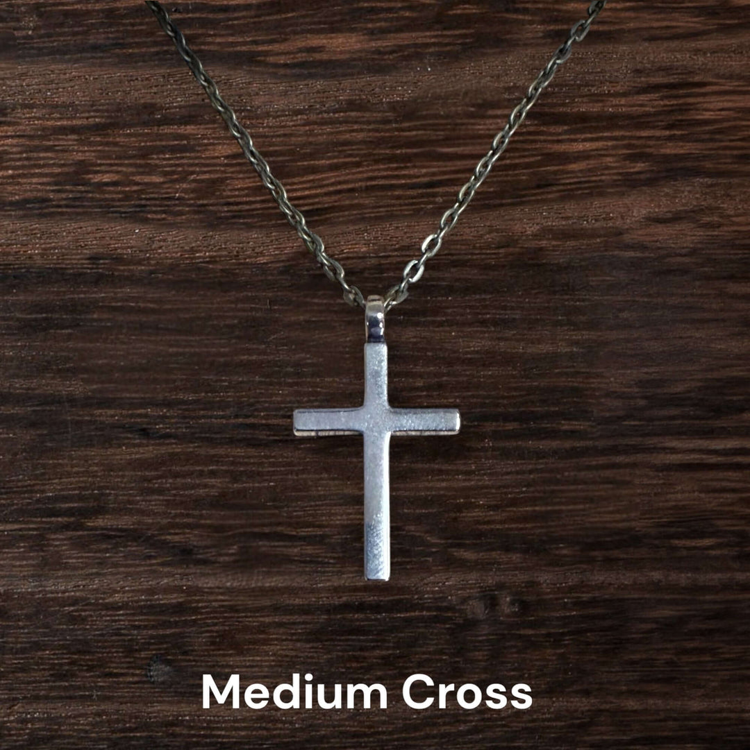 Handcrafted solid bronze cross necklace on an antique bronze chain. Custom lengths available. Made in USA with a lifetime warranty.