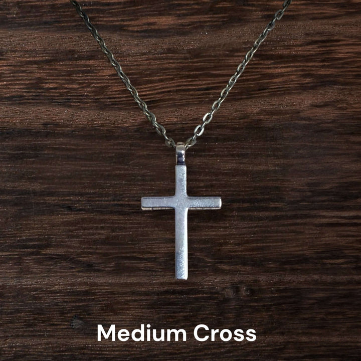 Handcrafted solid bronze cross necklace on an antique bronze chain. Custom lengths available. Made in USA with a lifetime warranty.