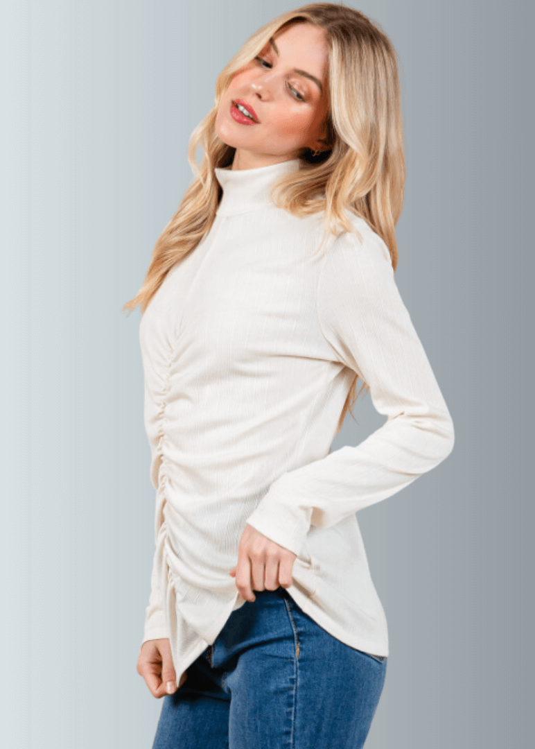 This Long Sleeve Mock Neck Top is a must-have for any wardrobe. It&