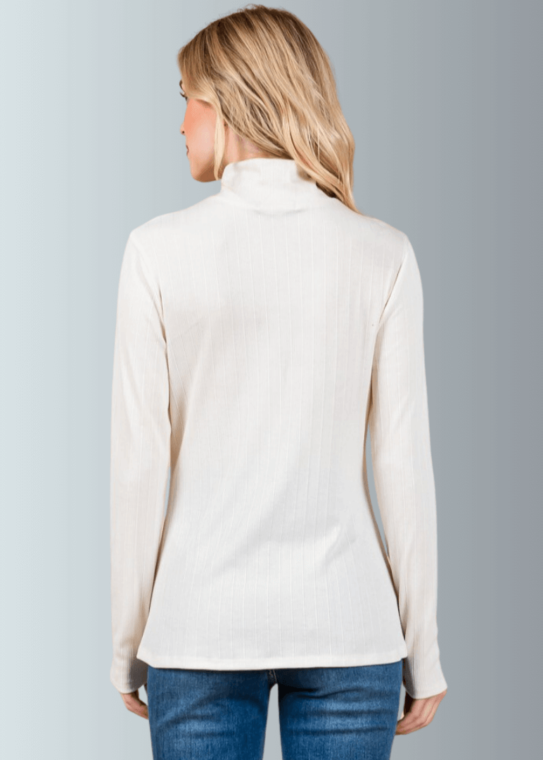 This Long Sleeve Mock Neck Top is a must-have for any wardrobe. It&