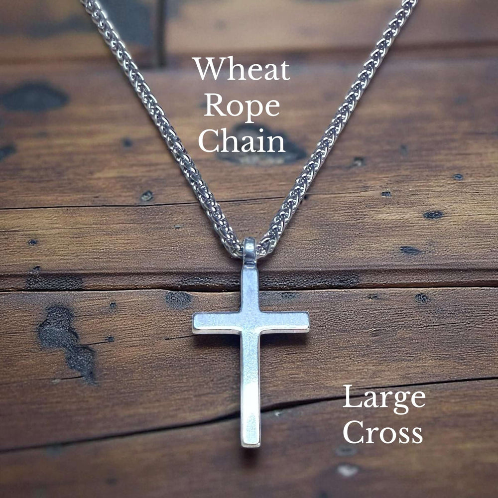 Handcrafted solid sterling silver cross necklace on a stainless steel chain. Custom lengths available. Made in USA with a lifetime warranty. 