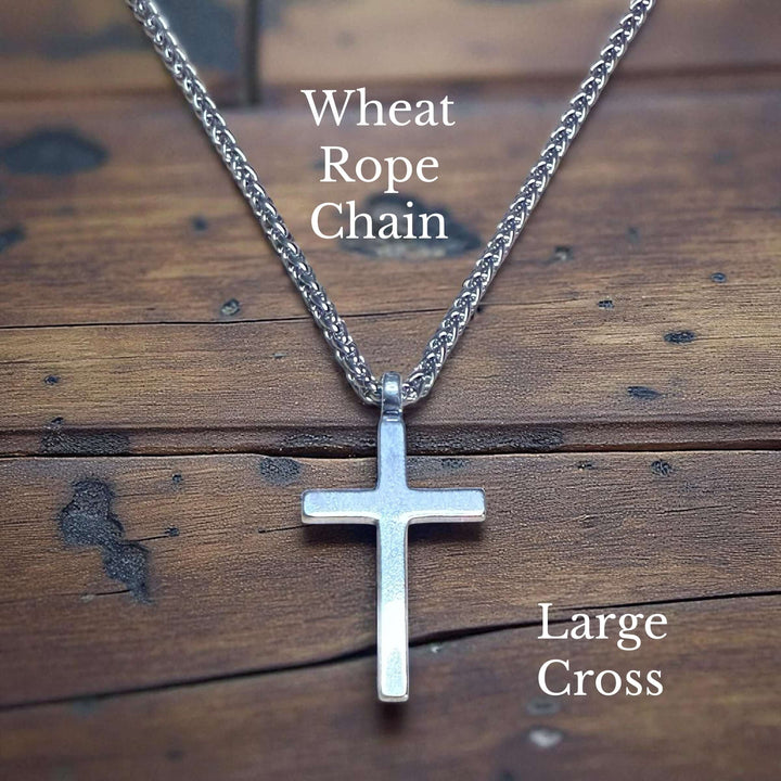 Handcrafted solid sterling silver cross necklace on a stainless steel chain. Custom lengths available. Made in USA with a lifetime warranty. 