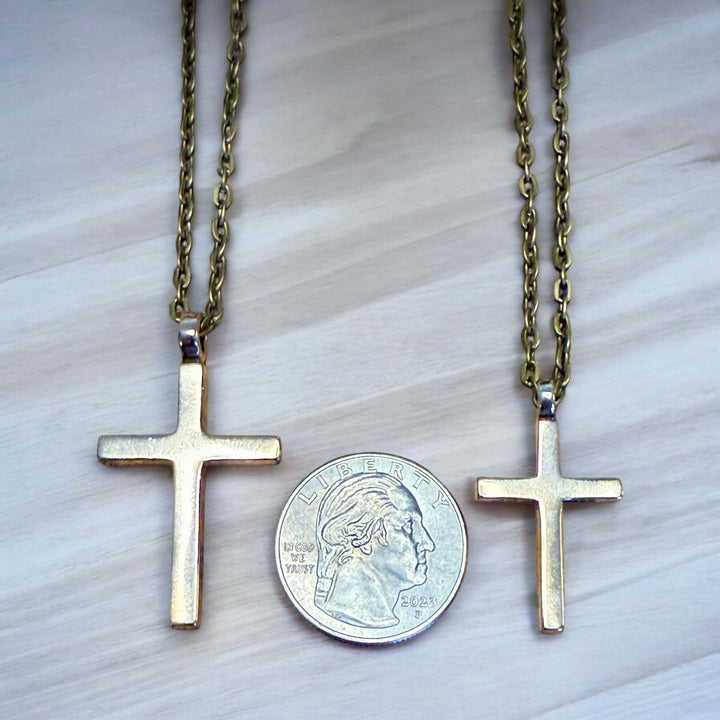 Handcrafted solid bronze cross necklace on an antique bronze chain. Custom lengths available. Made in USA with a lifetime warranty.