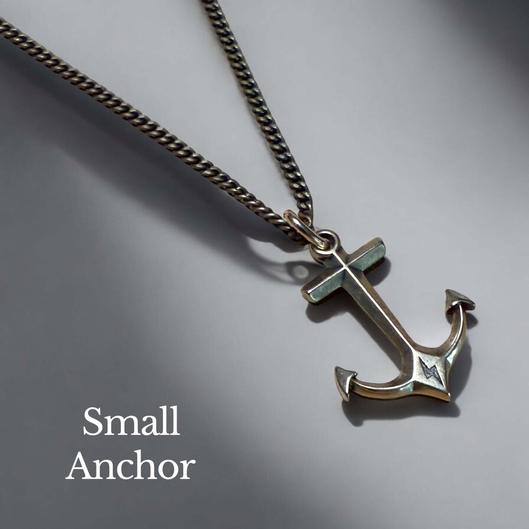 Handcrafted solid bronze anchor necklace on an antique bronze chain. Unisex. Custom lengths available. Made in USA with a lifetime warranty.