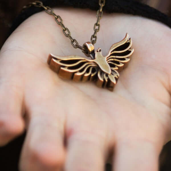 Handcrafted solid bronze eagle necklace on a 20 or 24 inch antique bronze chain. Made in USA with a lifetime warranty.
