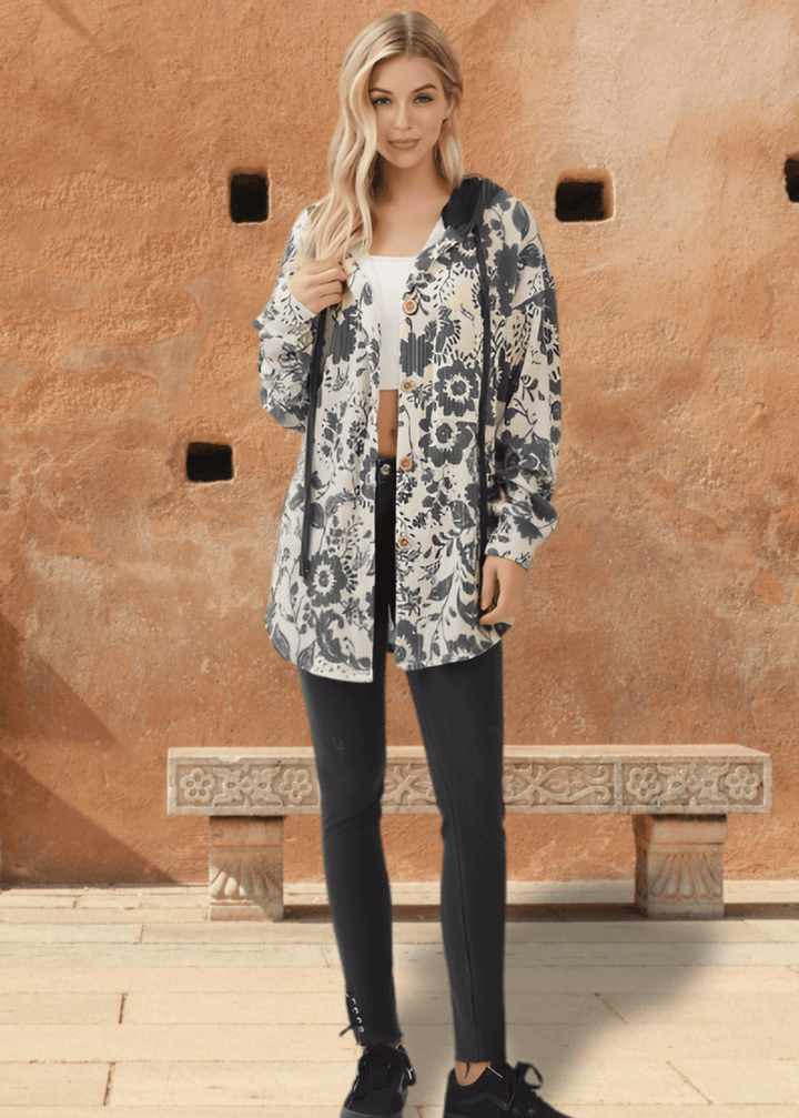 Elevate your layering game with the Elise Floral Ribbed Knit Shacket—a versatile piece that seamlessly transitions from season to season. Crafted from a soft ribbed knit in a striking allover floral pattern, this shacket combines comfort with contemporary style. 