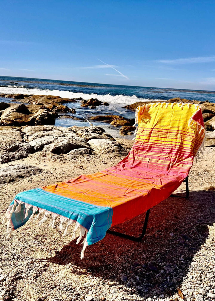 Shop the Beachables Striped 3-in-1 Turkish Cotton Beach Bag – converts from bag to towel to chair cover. Sand-resistant, quick-dry, machine washable. Made in USA.