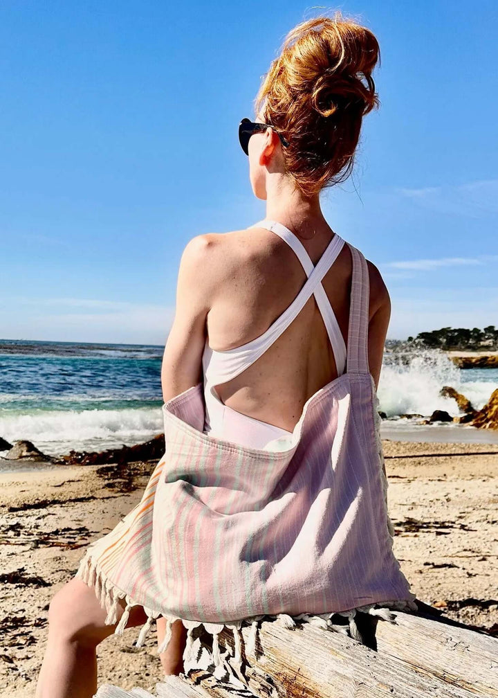 Shop the Beachables Striped 3-in-1 Turkish Cotton Beach Bag – converts from bag to towel to chair cover. Sand-resistant, quick-dry, machine washable. Made in USA.