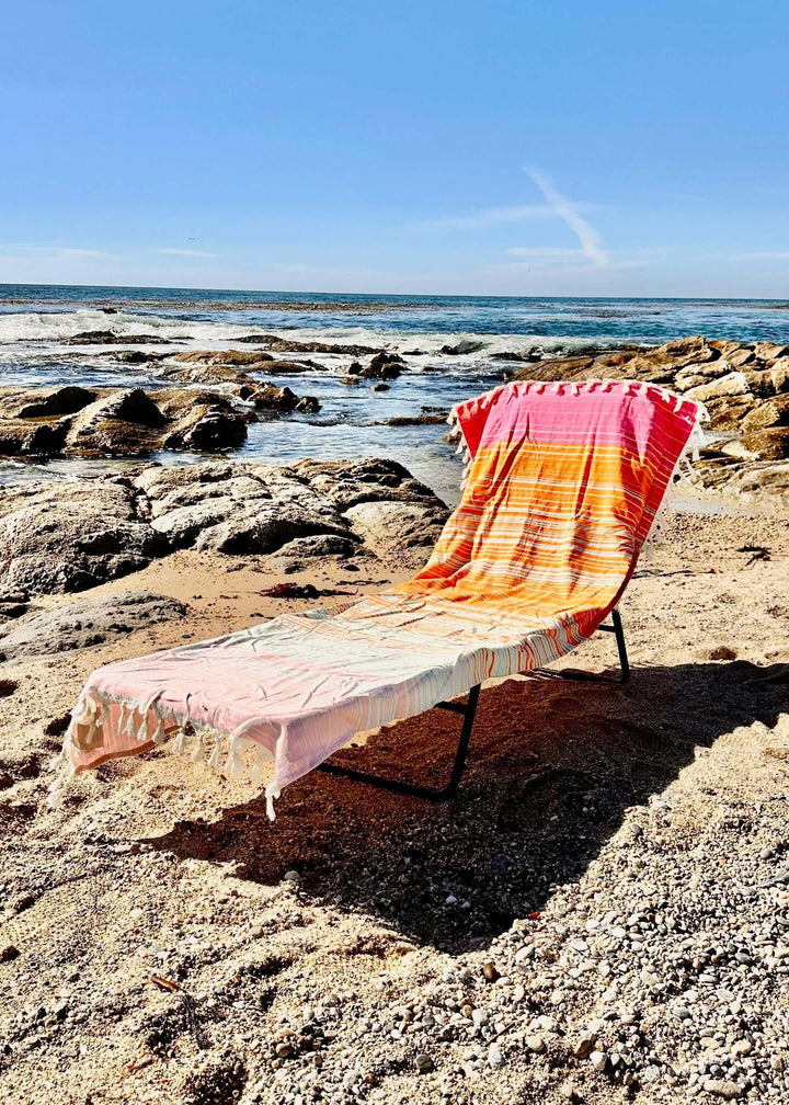 Shop the Beachables Striped 3-in-1 Turkish Cotton Beach Bag – converts from bag to towel to chair cover. Sand-resistant, quick-dry, machine washable. Made in USA.