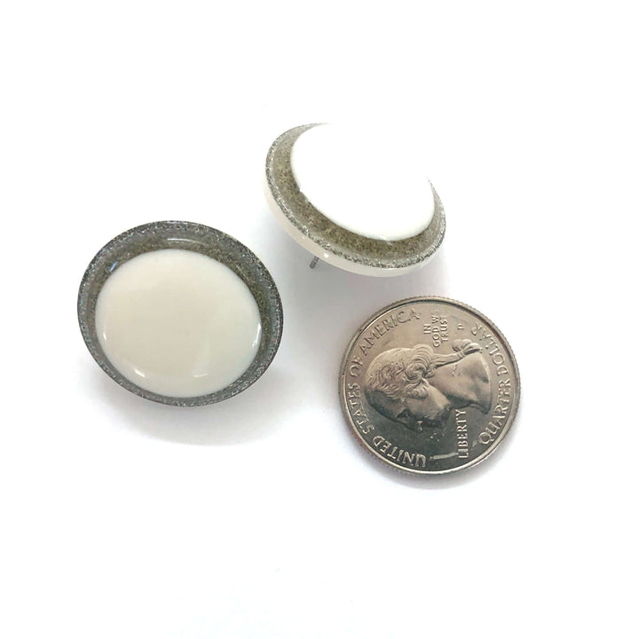 Vintage beveled disc studs in white resin &amp; silver glitter, 24mm. Surgical steel posts, lightweight. 1960s Lucite, handcrafted in the USA.