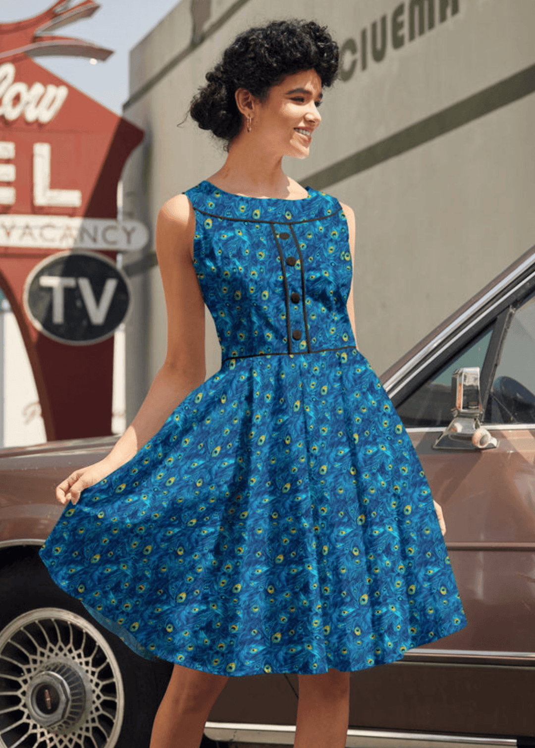 Shop the Elizabeth Dress by Retrolicious — vintage peacock print, piping details, knee length, pockets, 100% cotton. Made in USA. Sizes XS–4X.