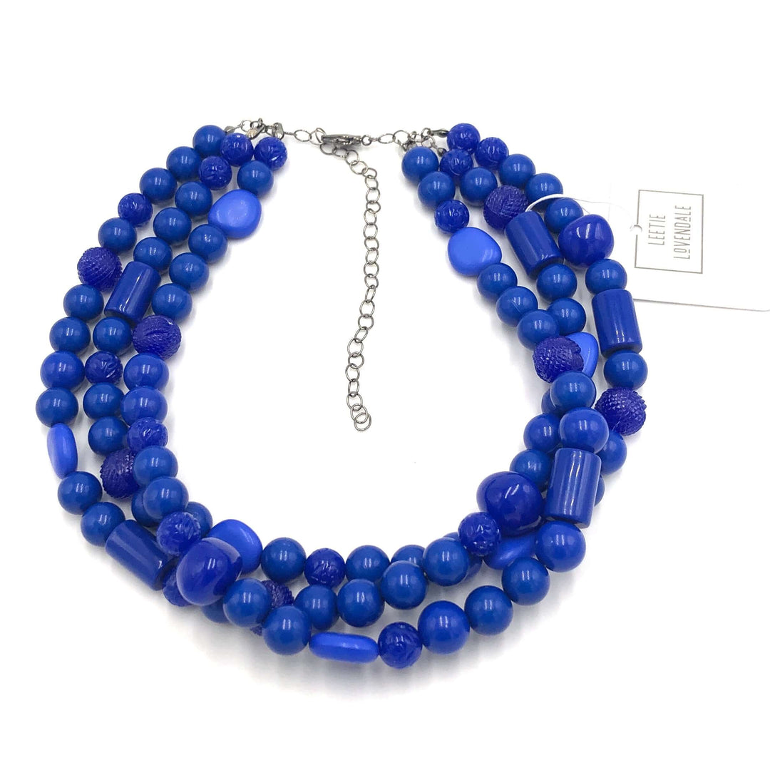 3-strand true blue shiny opaque 1960s Lucite beaded necklace, hand-finished in the USA. Sustainable vintage deadstock. 15.5-16" + 6" extender.