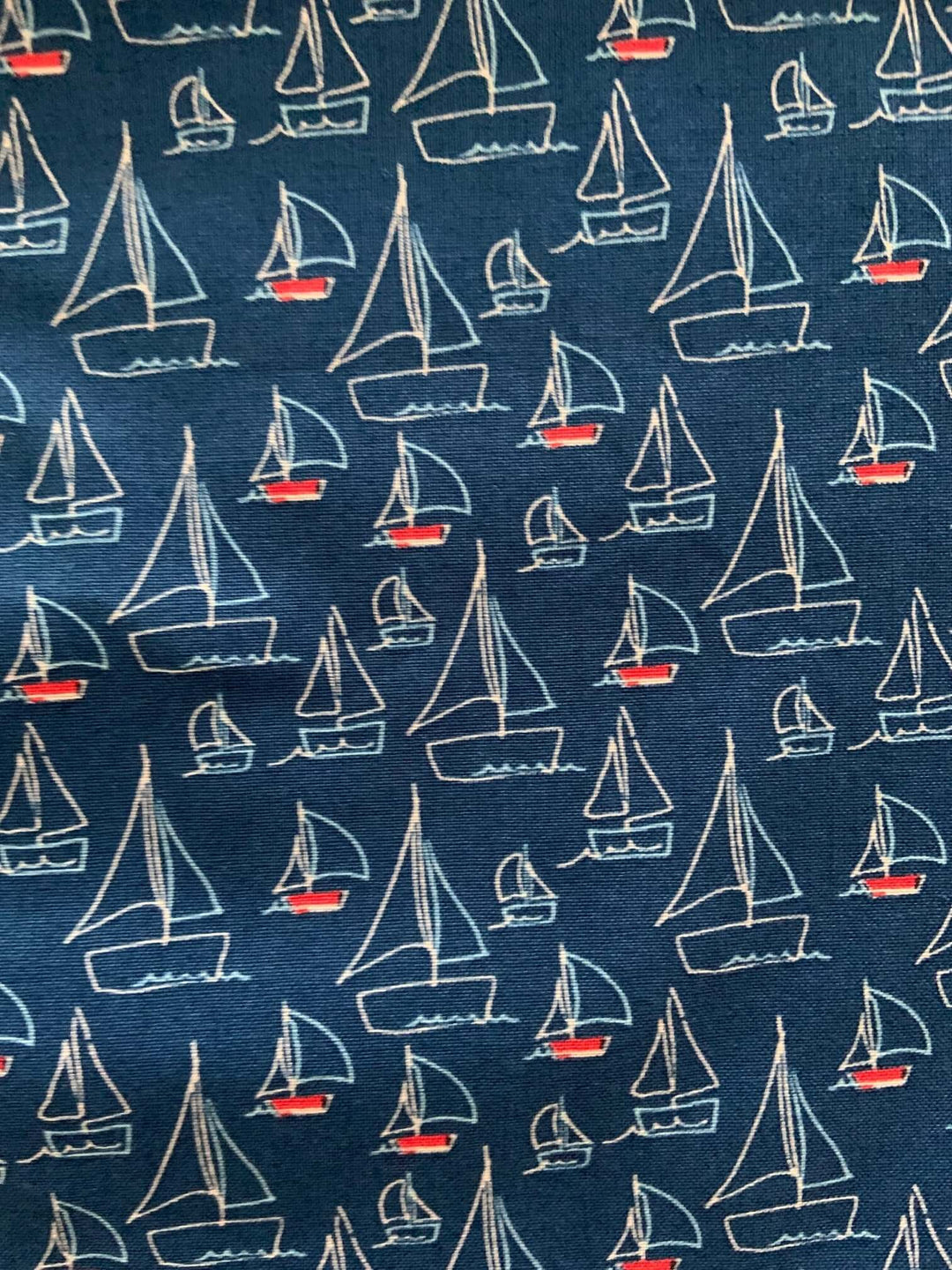 Vintage Tops This top is for the vintage lover at heart! Shown in our sailboats print, this 100% cotton top features bust darts for a flattering silhouette, a side zippered closure for ease of wear, and an oversized bow at the neckline for that perfect 1950&