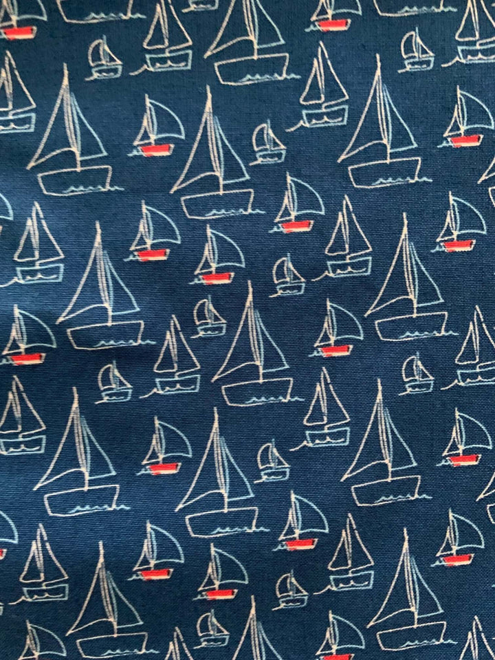 Vintage Tops This top is for the vintage lover at heart! Shown in our sailboats print, this 100% cotton top features bust darts for a flattering silhouette, a side zippered closure for ease of wear, and an oversized bow at the neckline for that perfect 1950&