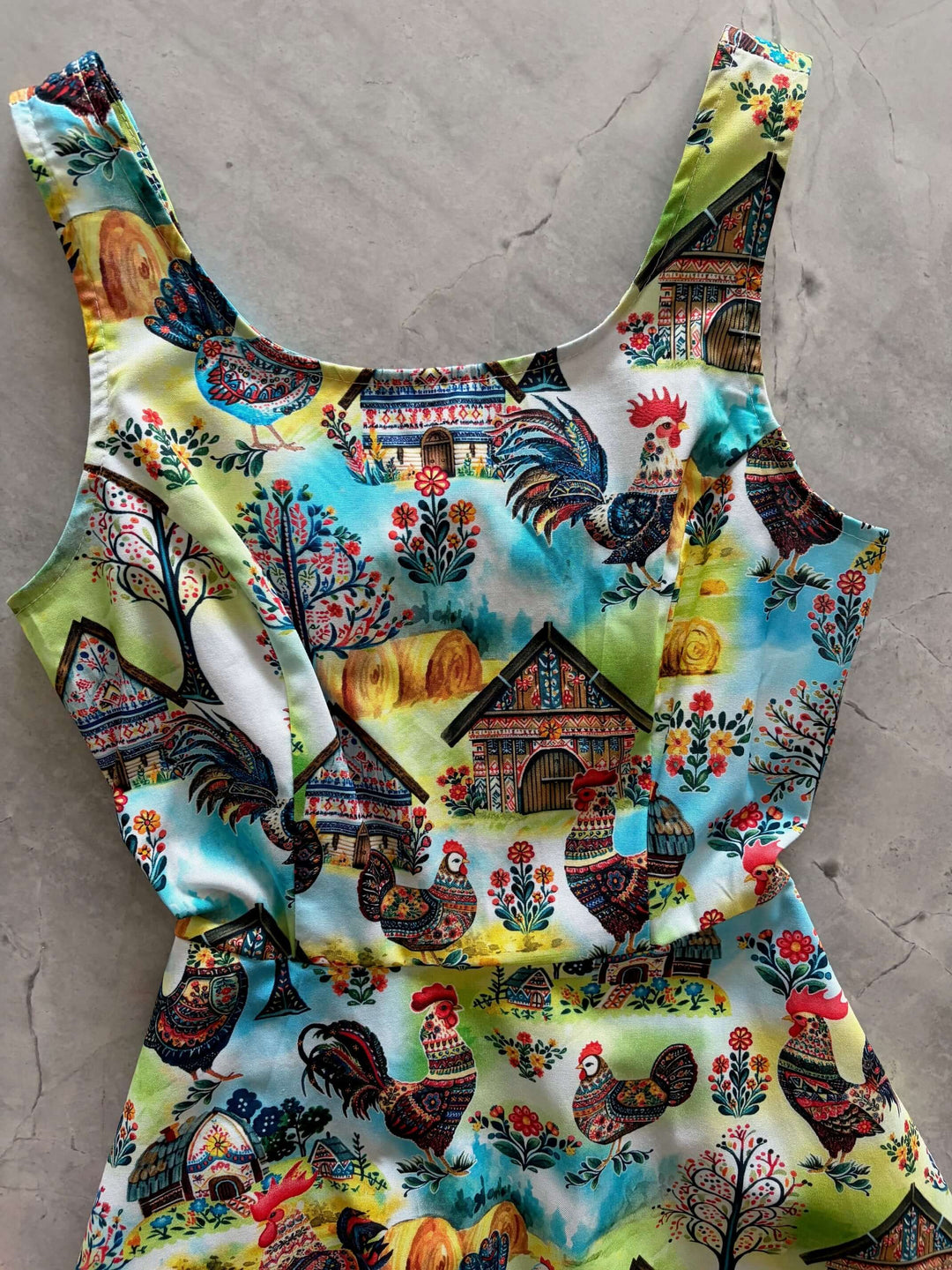 Shop the Farm Skater Dress by Retrolicious — vintage-style A-line, farm print, pockets, stretch cotton. Made in USA. Sizes XS–4X.