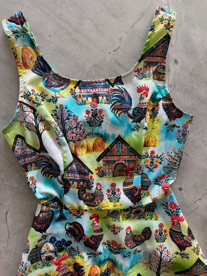 Shop the Farm Skater Dress by Retrolicious — vintage-style A-line, farm print, pockets, stretch cotton. Made in USA. Sizes XS–4X.