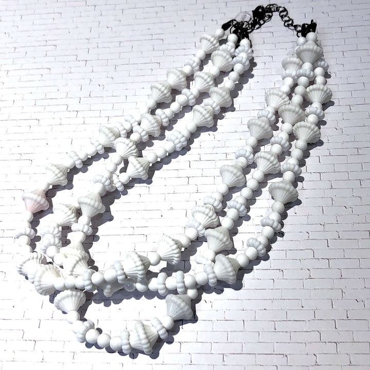 3-strand opaque white 1960s Lucite beaded necklace, hand-finished in the USA. Sustainable vintage deadstock. 15.5-16" + 6" extender.