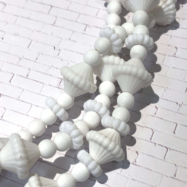3-strand opaque white 1960s Lucite beaded necklace, hand-finished in the USA. Sustainable vintage deadstock. 15.5-16" + 6" extender.