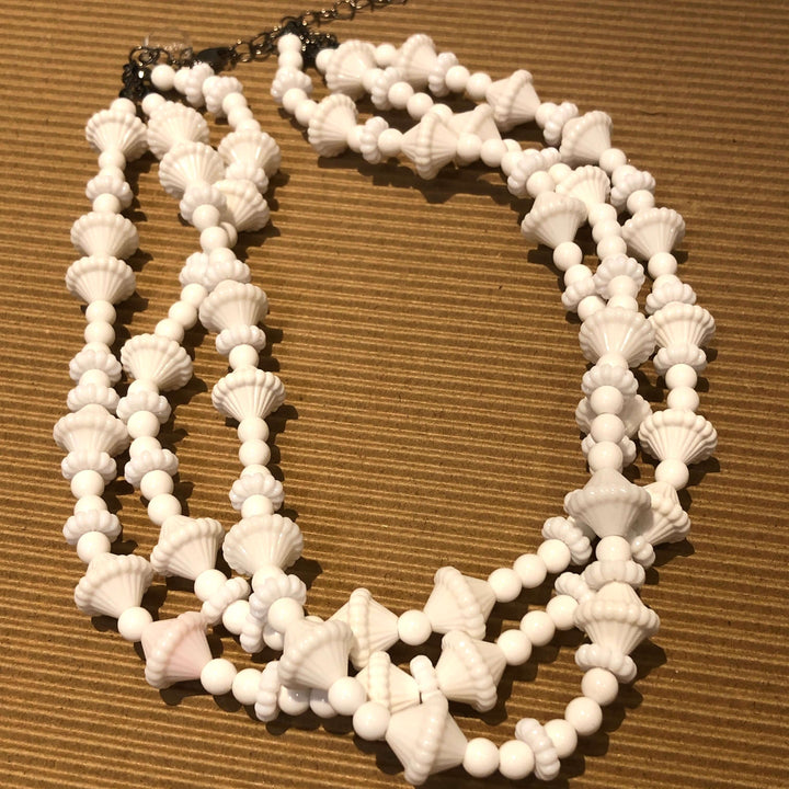 3-strand opaque white 1960s Lucite beaded necklace, hand-finished in the USA. Sustainable vintage deadstock. 15.5-16" + 6" extender.