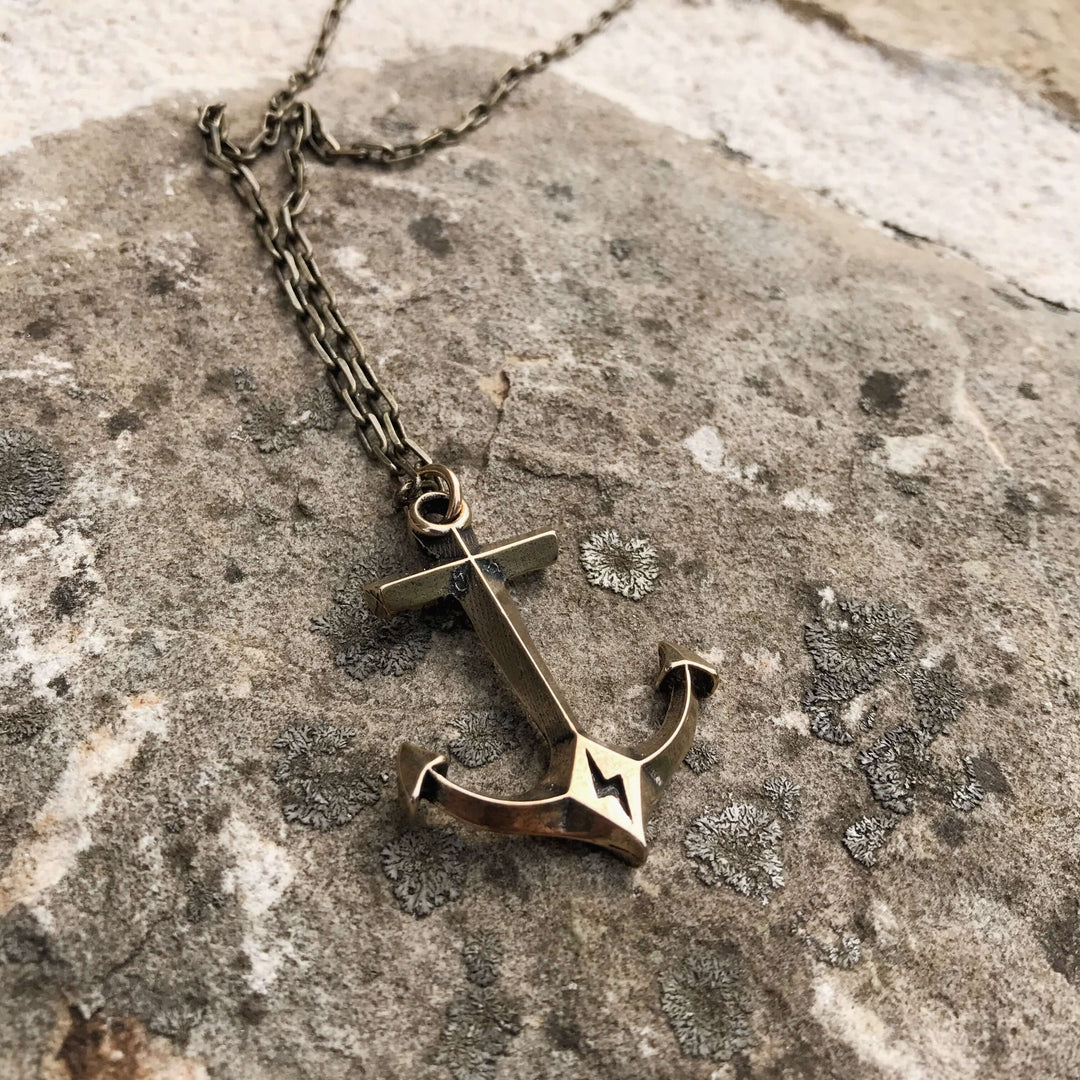 Handcrafted solid bronze anchor necklace on an antique bronze chain. Unisex. Custom lengths available. Made in USA with a lifetime warranty.
