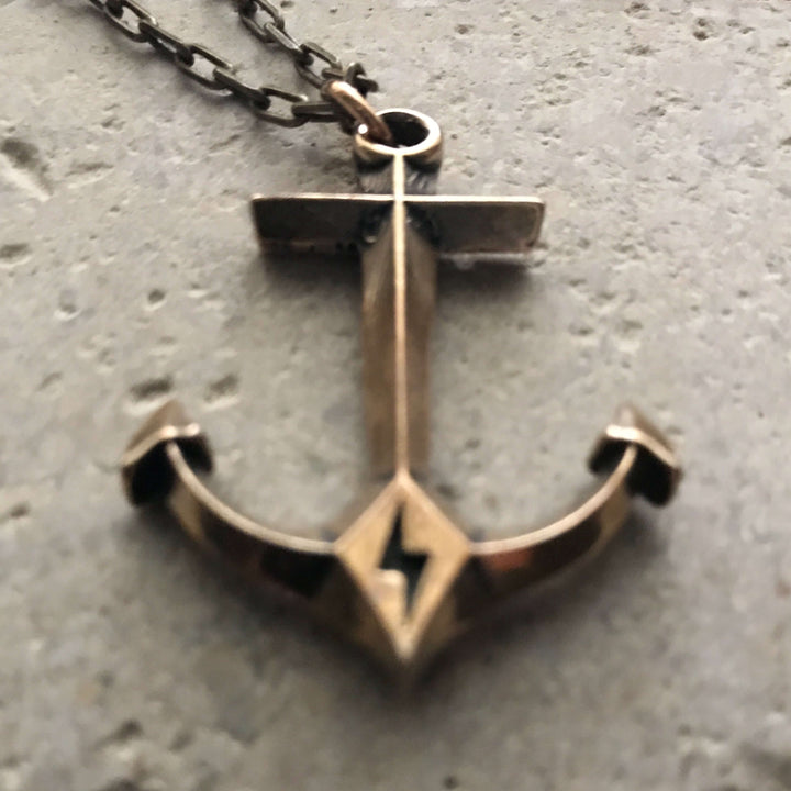 Handcrafted solid bronze anchor necklace on an antique bronze chain. Unisex. Custom lengths available. Made in USA with a lifetime warranty.
