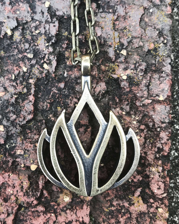 Handcrafted solid bronze lotus flower necklace on an 18 or 24 inch antique bronze chain. Made in USA with a lifetime warranty.