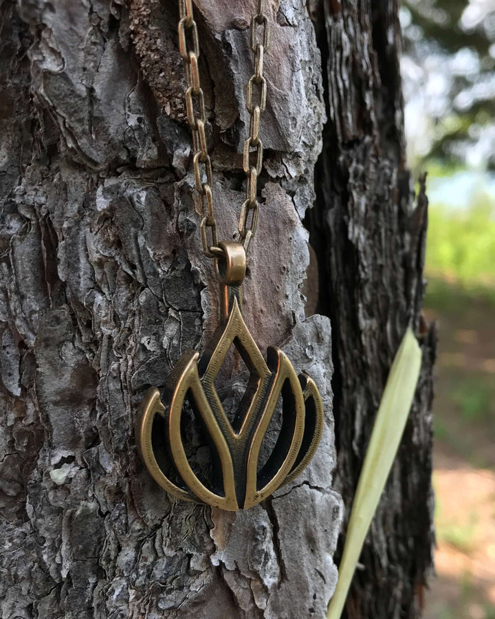 Handcrafted solid bronze lotus flower necklace on an 18 or 24 inch antique bronze chain. Made in USA with a lifetime warranty.
