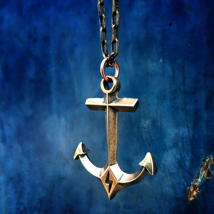 Handcrafted solid bronze anchor necklace on an antique bronze chain. Unisex. Custom lengths available. Made in USA with a lifetime warranty.