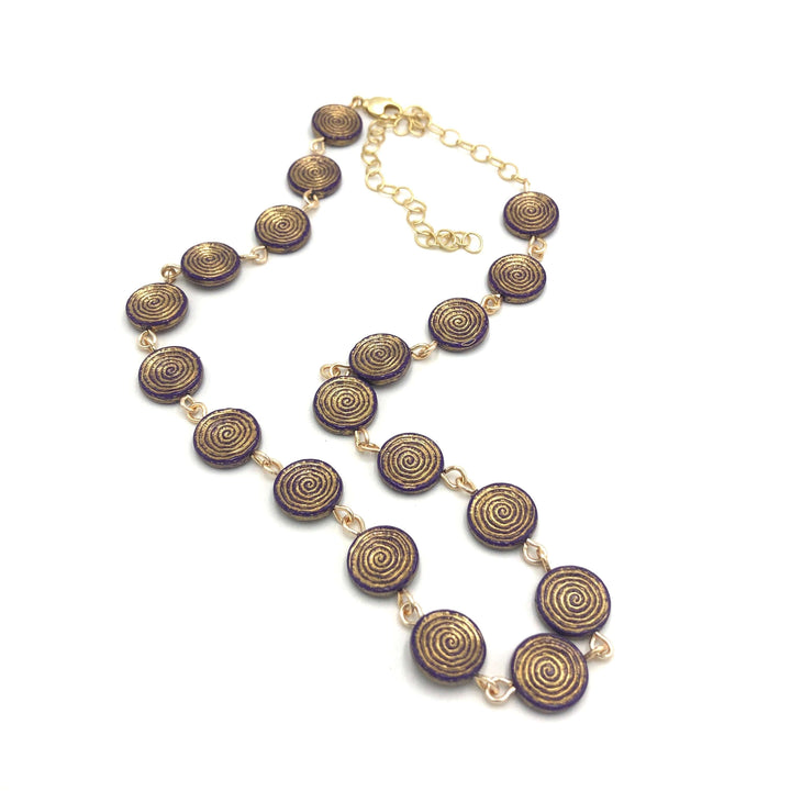 Deep purple German Lucite beads with gold spiral etching, hand-linked rosary style. Vintage deadstock, handcrafted in the USA.