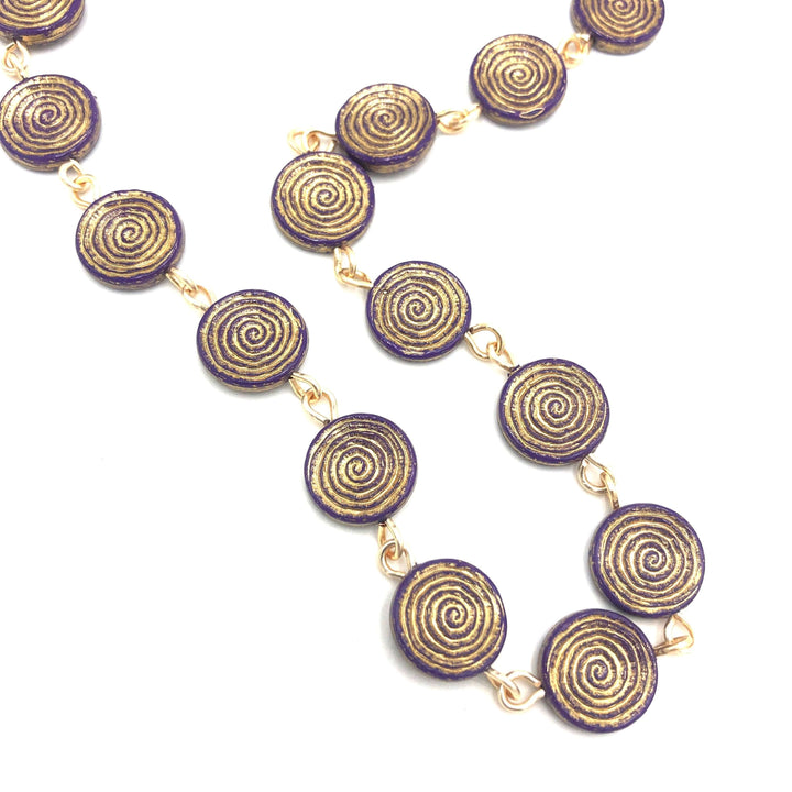 Deep purple German Lucite beads with gold spiral etching, hand-linked rosary style. Vintage deadstock, handcrafted in the USA.