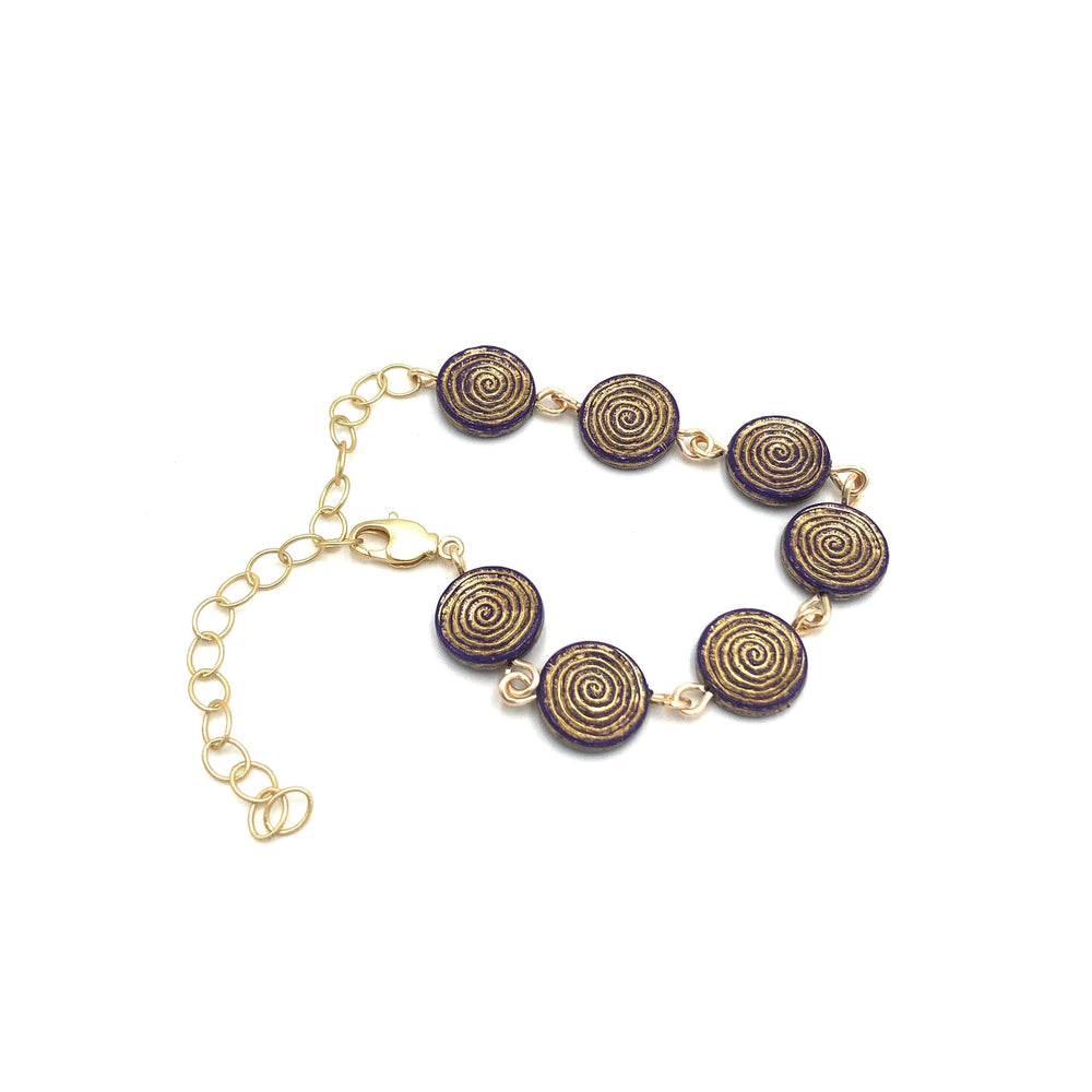 Dainty stackable bracelet with golden-washed purple Lucite beads, hand-linked. Vintage '60s-'80s components, adjustable 6.5"-10". Made in USA.