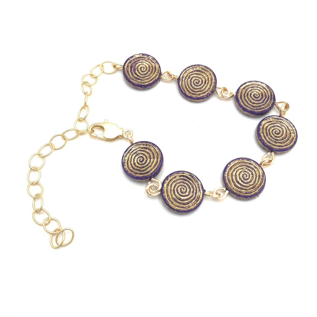 Dainty stackable bracelet with golden-washed purple Lucite beads, hand-linked. Vintage &