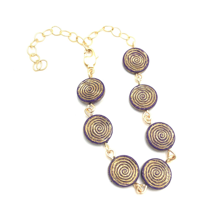 Dainty stackable bracelet with golden-washed purple Lucite beads, hand-linked. Vintage &
