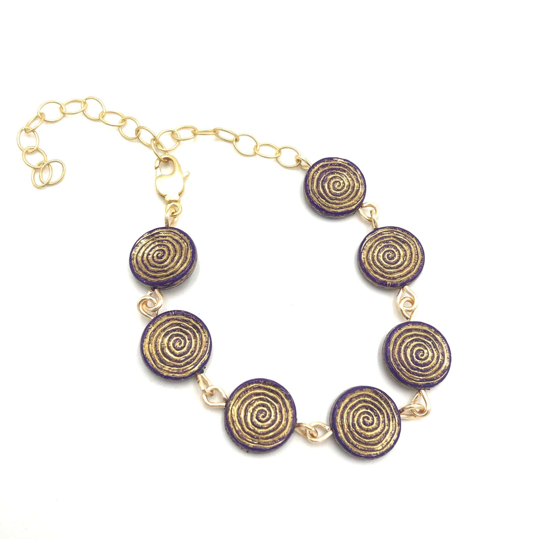 Dainty stackable bracelet with golden-washed purple Lucite beads, hand-linked. Vintage &
