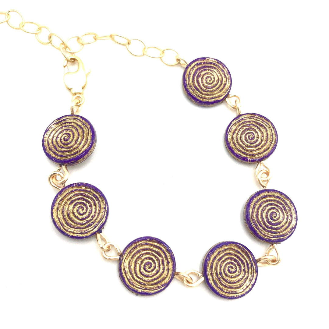 Dainty stackable bracelet with golden-washed purple Lucite beads, hand-linked. Vintage &