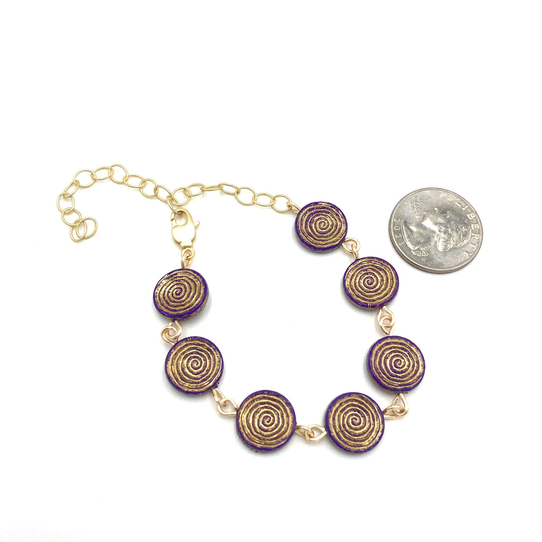 Dainty stackable bracelet with golden-washed purple Lucite beads, hand-linked. Vintage &