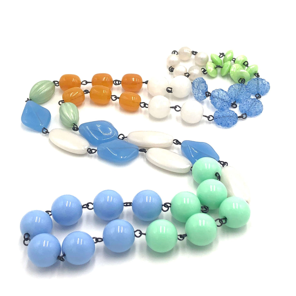 44" bohemian rope necklace in pastel blue, mint & gold vintage Lucite beads. Wear long or doubled. Every bead vintage, handcrafted in USA.