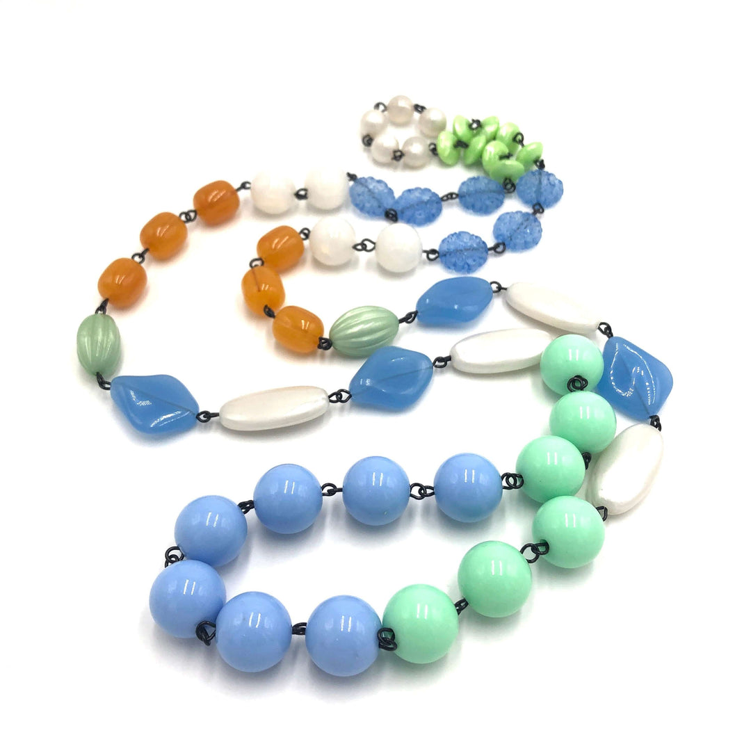 44" bohemian rope necklace in pastel blue, mint & gold vintage Lucite beads. Wear long or doubled. Every bead vintage, handcrafted in USA.