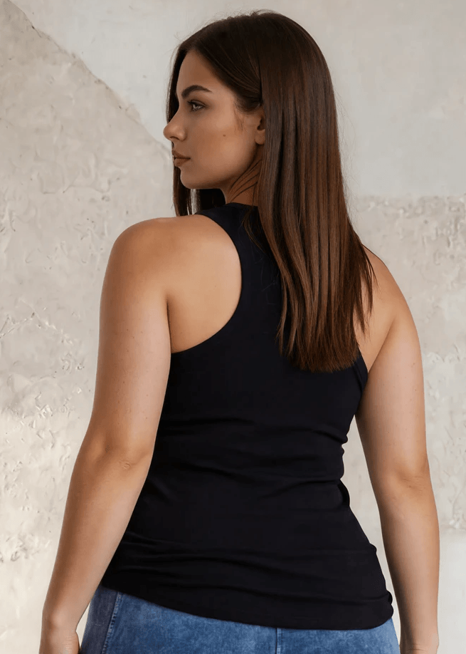 The Tummy Tucker by Bra30 is an extra-long extra supportive racerback tank top that comfortably helps smooth out those unwanted lumps and bumps. Made with 90% Cotton and 10% Spandex this ribbed fabric was 100% made with your comfort in mind. Proudly made for women by a woman, here in the USA A bra 30 tank designed with soft compression to smooth and support without squeezing. The Tummy Tucker is flattering, breathable, and fits like a dream.