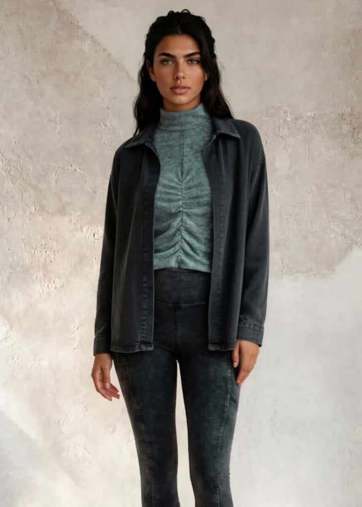 This Long Sleeve Mock Neck Top is a must-have for any wardrobe. It&