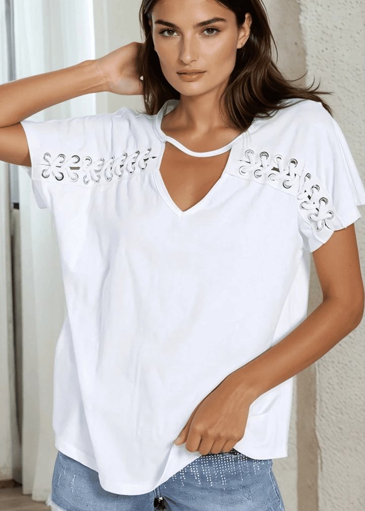 Effortlessly chic and breathable, the Lara Laced Up Cut Out Top in Bright White combines a flattering oversized silhouette with a striking V-neck cutout and delicate laced-up detailing. Crafted in the USA from 100% cotton