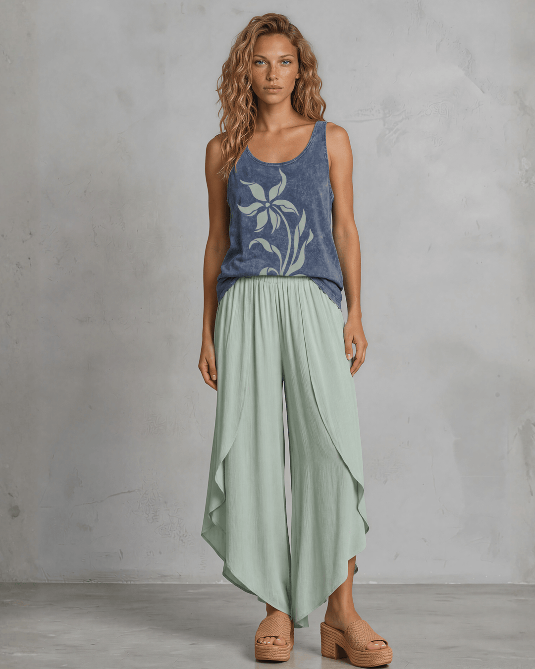 Lily Whisper botanical floral graphic tank in mineral-washed denim blue. Made in USA with USA-grown cotton, soft 95% cotton/5% spandex, relaxed fit.