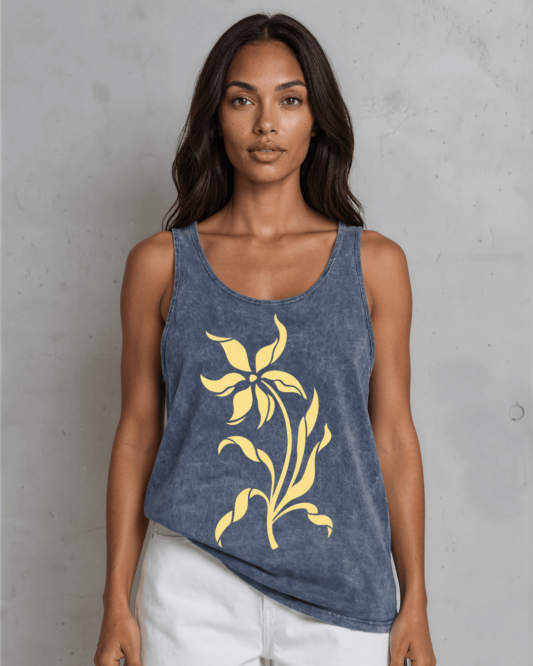 Lily Whisper botanical floral graphic tank in mineral-washed denim blue. Made in USA with USA-grown cotton, soft 95% cotton/5% spandex, relaxed fit.